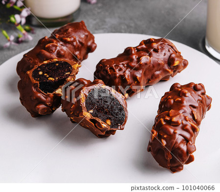 chocolate bars on plate close up 101040066