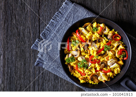 Chicken Paella with mushrooms, red pepper, spices Chicken Paella with mushrooms, red pepper, spices 101041913