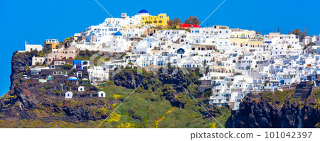 Santorini, Greece houses and churches banner 101042397