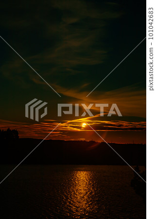 Beautiful sunset on river Kymijoki at autumn, Finland. Beautiful sunset on river Kymijoki at autumn, Finland. 101042683