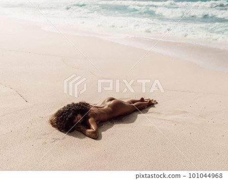 Latin nudist Naked girl sunbathe on beach. Sexy latin model... - Stock Photo [101044968]  - PIXTA