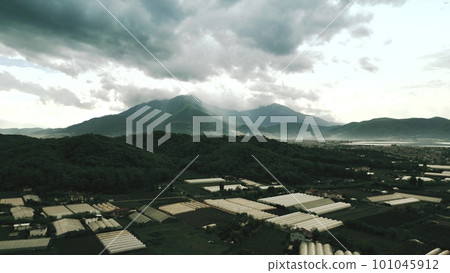 Aerial shot of greenhouses and mountains near town of Fethiye, Turkey Aerial shot of greenhouses and mountains near town of Fethiye, Turkey 101045912