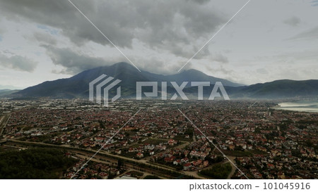 Aerial view of Fethiye and surrounding mountains on a beautiful partially cloudy and rainy day, Turkey 101045916