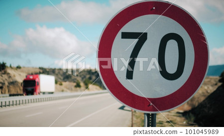 Highway 70 kmh speed limit road sign 101045989