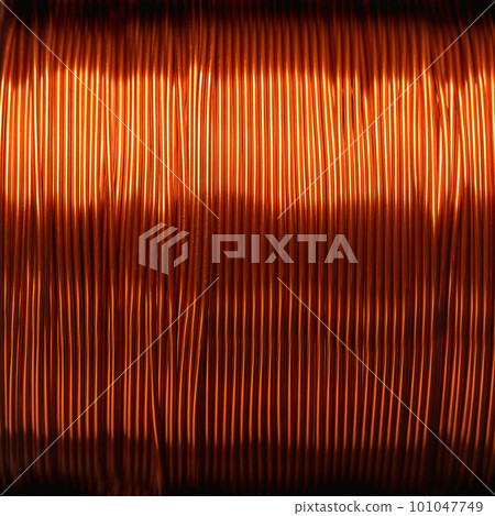 Copper wire, enamelled, on a coil, close up. Double coated and insulated copper winding wire on a spool, for electric motors, transformers and electronic projects, with a thickness of 0.30 mm. Photo. Copper wire, enamelled, on a coil, close up. Double coated and insulated copper winding wire on a spool, for electric motors, transformers and electronic projects, with a thickness of 0.30 mm. Photo. 101047749