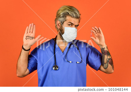 Open palm stop gesture. Critical number or density of susceptible hosts. Epidemic threshold. Man in medical lab. Protective mask. Stop epidemic. Virus concept. Danger zone. Epidemic infection 101048144