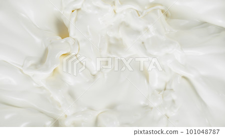 Freeze motion of whirling milk cream, close-up Freeze motion of whirling milk cream, close-up 101048787
