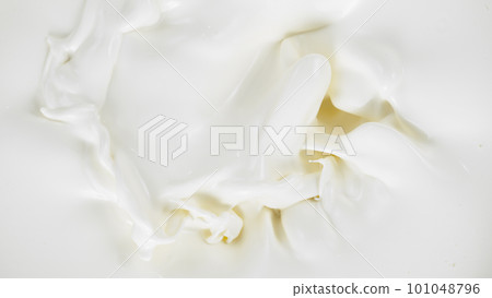 Freeze motion of whirling milk cream, close-up Freeze motion of whirling milk cream, close-up 101048796