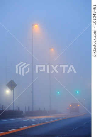 road covered in fog road covered in fog 101049461