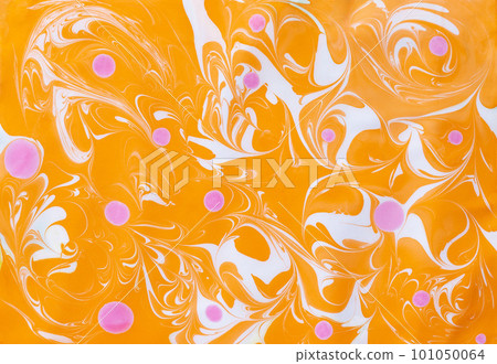 Abstract marbling ebru colorful orange background with waves and pink blots 101050064