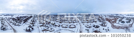 Panoramic drone aerial photo of the south side of Sioux Falls, South Dakota during the winter after a snow storm. 101050238