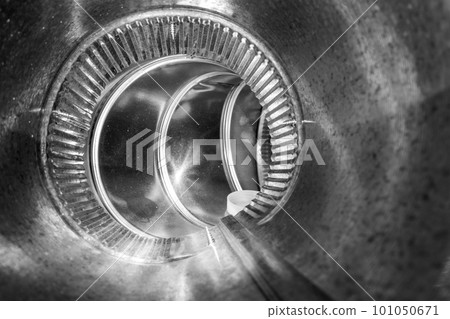 Interior view of residential HVAC galvanized metal duct piping 101050671