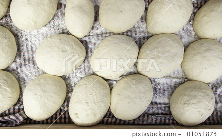 Fresh bread dough in bakery 101051873