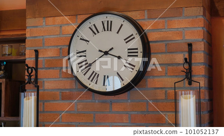 romannumerals old clock on the wall romannumerals old clock on the wall 101052137