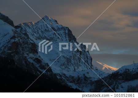 Mount Arpelistock and sun lit Sandgrat 101052861