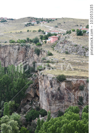 View of the Ihlara valley with cliff edge and forest in Aksaray, Central Anatolia, Turkey View of the Ihlara valley with cliff edge and forest in Aksaray, Central Anatolia, Turkey 101053185