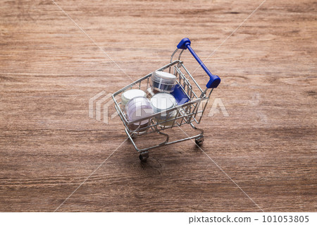 Many colorful natural mineral eyeshadows on wooden background with copy space and empty space for text 101053805