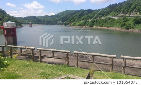 Landscape with a dam 101054075