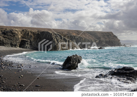 Pena Horadada beach with giant rocks, Fuerteventura Pena Horadada beach with giant rocks, Fuerteventura 101054187