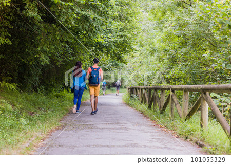 Unrecognizable mixed race mid couple ecotourism hiking in senda del oso, Asturias conservation Unrecognizable mixed race mid couple ecotourism hiking in senda del oso, Asturias conservation 101055329
