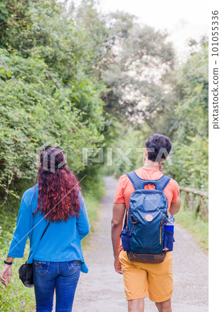 Unrecognizable mixed race mid couple ecotourism hiking in senda del oso, Asturias conservation Unrecognizable mixed race mid couple ecotourism hiking in senda del oso, Asturias conservation 101055336
