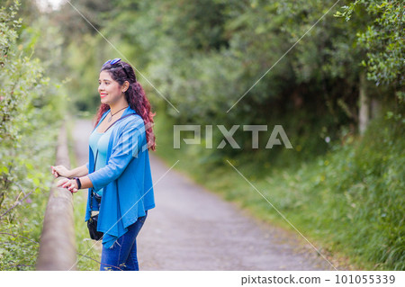 thinking outside in nature wellness self care relaxation. south american woman in senda del oso thinking outside in nature wellness self care relaxation. south american woman in senda del oso 101055339