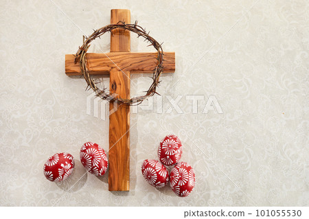 Christian Cross and and Colorful Easter Eggs on vintage background 101055530