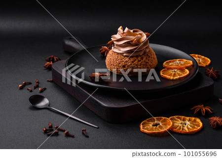 Delicious sweet shu cake with cream and nuts Delicious sweet shu cake with cream and nuts 101055696