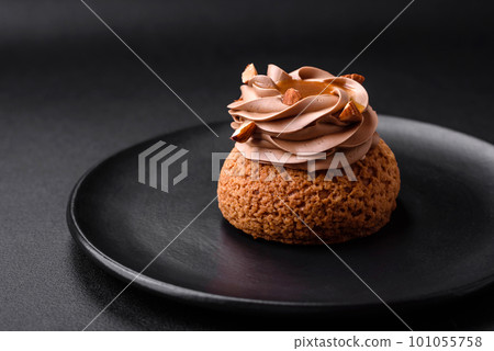 Delicious sweet shu cake with cream and nuts Delicious sweet shu cake with cream and nuts 101055758