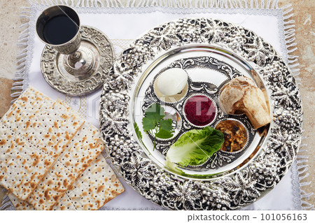 Composition with symbolic Passover, Pesach, items and meal on stone background, Composition with symbolic Passover, Pesach, items and meal on stone background, 101056163