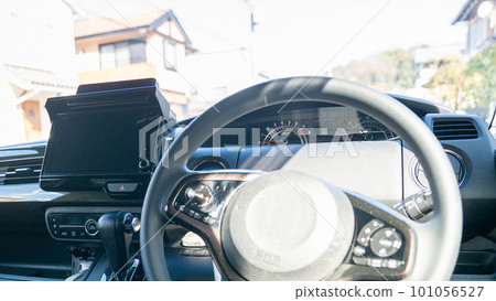 Inside the car around the steering wheel 101056527