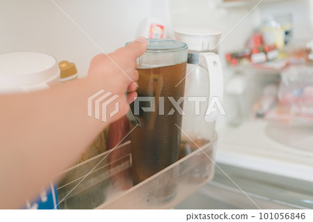 Get some barley tea from the fridge 101056846