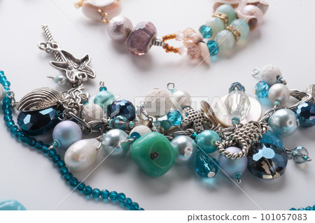 author braceletes with pearls and gemstones. fashion and jewelry concept author braceletes with pearls and gemstones. fashion and jewelry concept 101057083