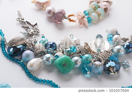 author braceletes with pearls and gemstones. fashion and jewelry concept author braceletes with pearls and gemstones. fashion and jewelry concept 101057084