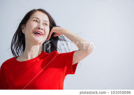 Senior woman hair care image Senior woman hair care image 101058096
