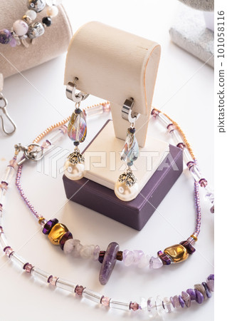 author beautiful   jewelry with gemstones demonstrated around white backround. fashion and jewelry concept 101058116