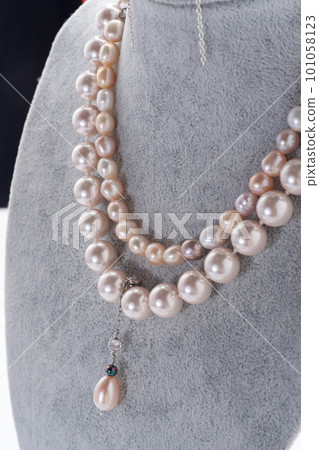 author beautiful jewelry with pearls demonstrated around white backround. fashion and jewelry concept author beautiful jewelry with pearls demonstrated around white backround. fashion and jewelry concept 101058123