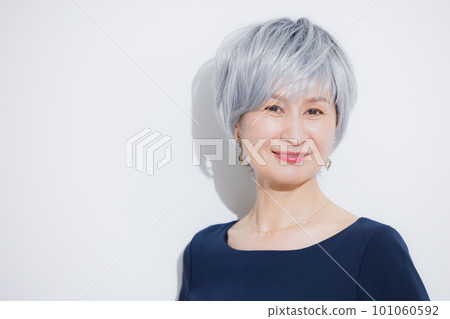 A woman with gray hair A woman with gray hair 101060592
