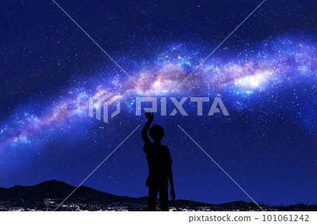 person looking up at the Milky Way person looking up at the Milky Way 101061242