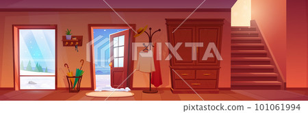 House hallway interior with open door, winter view 101061994
