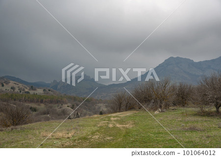 Territory of Karadag Reserve in spring. View of ridge Shuryu-kai rock. Crimea 101064012