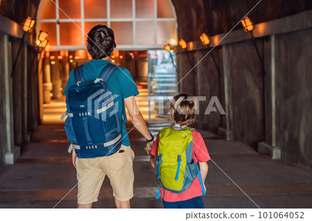 father and son tourists enjoying Beautiful cistern in Istanbul. Cistern - underground water reservoir build in 6th century, Istanbul, Turkey, Turkiye 101064052