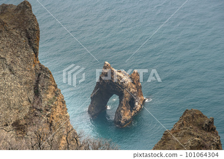 Top view of Golden Gate rock in the Black sea. Karadag Reserve in spring . Crimea Top view of Golden Gate rock in the Black sea. Karadag Reserve in spring . Crimea 101064304