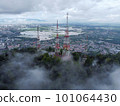 Aerial view telecommunication tower at hill top 101064430