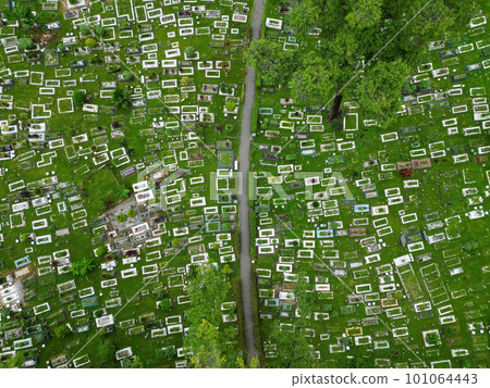 Aerial view of green lush Muslim cemetery 101064443