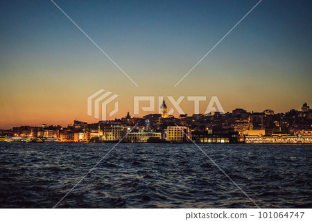 Istanbul city skyline in Turkey, Beyoglu district old houses with Galata tower on top, view from the Golden Horn Istanbul city skyline in Turkey, Beyoglu district old houses with Galata tower on top, view from the Golden Horn 101064747