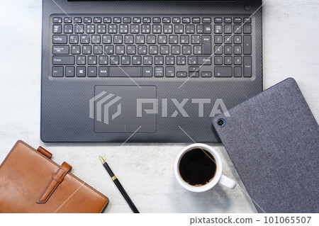 Image of desk work on a laptop Image of desk work on a laptop 101065507