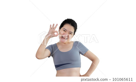 Young asian woman over white background doing ok sign with hands, OK symbol, Welcome, Agree, Join, Do as instructed, Follow orders, Acceptance of all conditions. 101065611