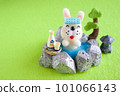Wool felt rabbit in an open-air bath 101066143