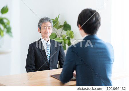 Businessmen having a meeting (business meeting interview) Businessmen having a meeting (business meeting interview) 101066482